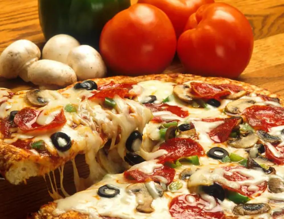 ‘पिज्जा’ खाने से दूर हो सकती है ये गंभीर बीमारी,वैज्ञानिकों ने किया खुलासा